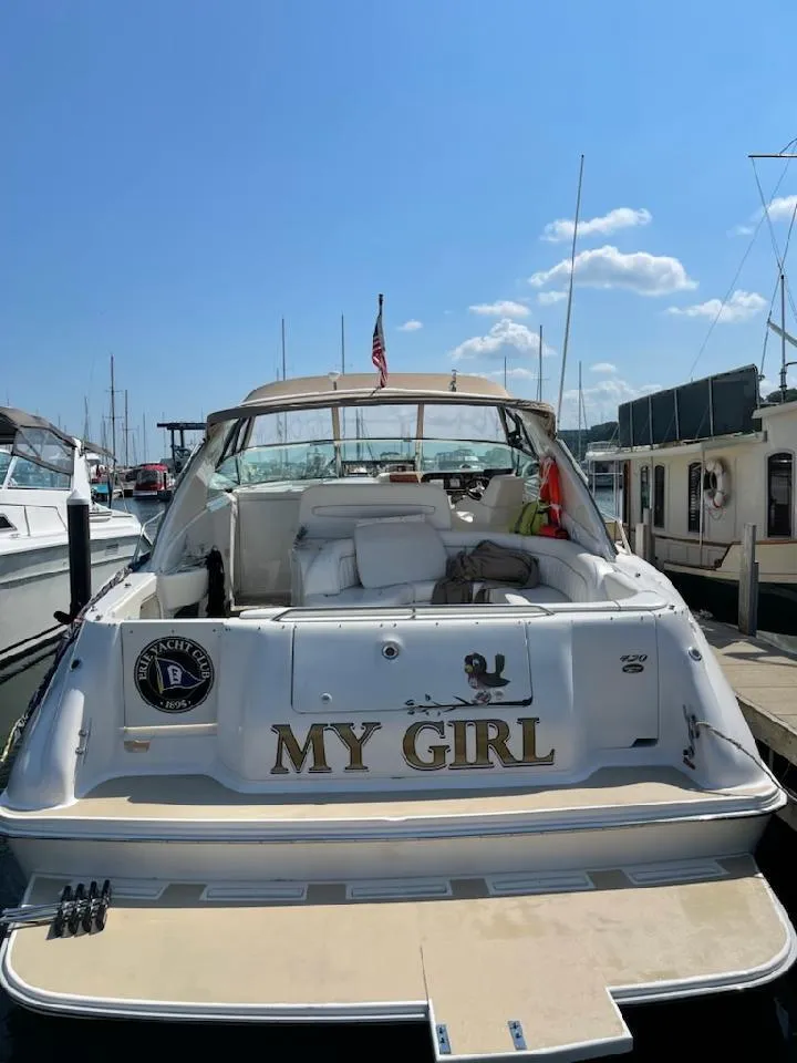 Slide: The Image of 1995 Sea Ray 450 Sundancer yacht named "My Girl" docked at marina. - 13