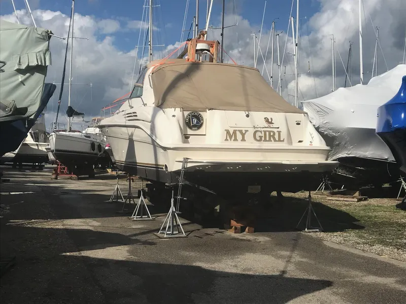 Slide: The Image of 1995 Sea Ray 450 Sundancer yacht named "My Girl" in dry dock. - 14