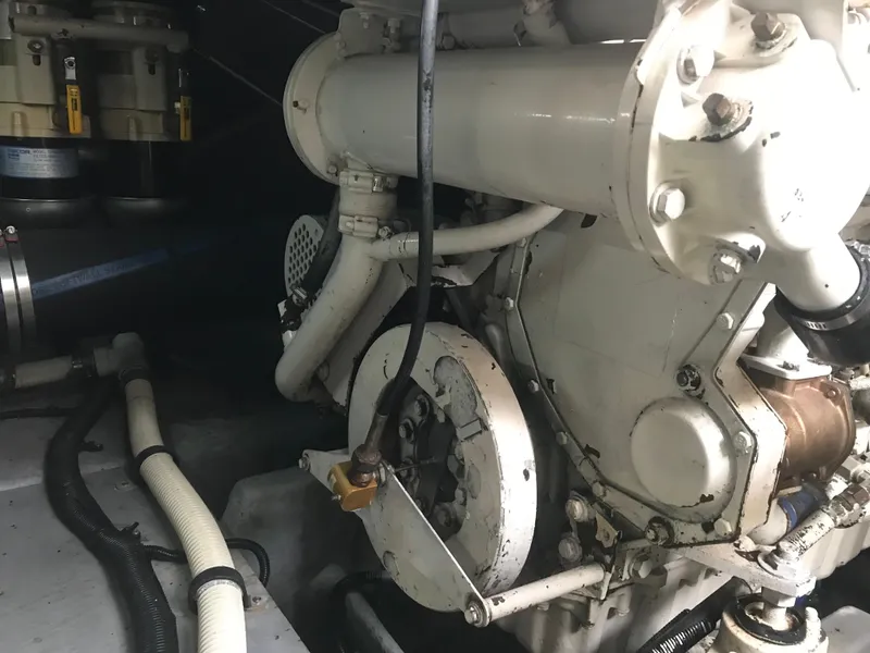 Slide: The Image of Engine room of 1995 Sea Ray 450 Sundancer yacht, showcasing mechanical components. - 40
