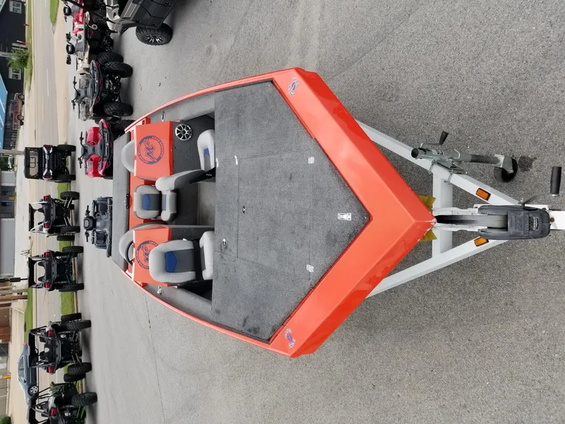 Slide: The Image of Custom 2012 welded boat with orange exterior and gray interior on a trailer. - 3