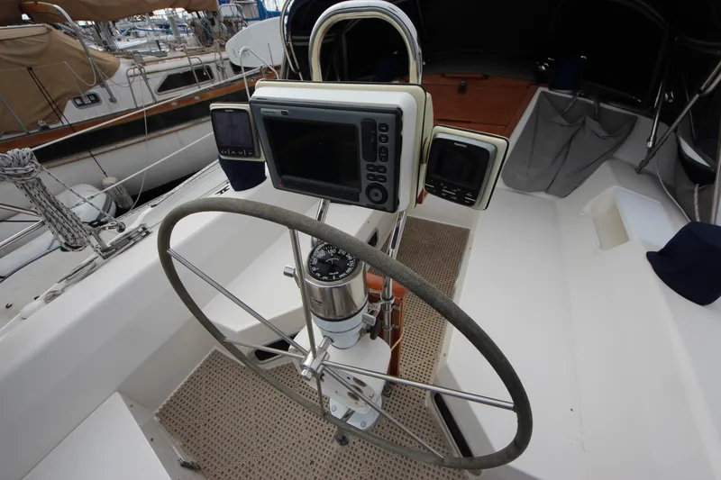 Slide: The Image of Steering wheel and navigation equipment on a 1993 Catalina 42 MKI sailboat. - 19