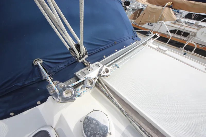 Slide: The Image of Close-up of 1993 Catalina 42 MKI sailboat deck with rigging and blue cover. - 27