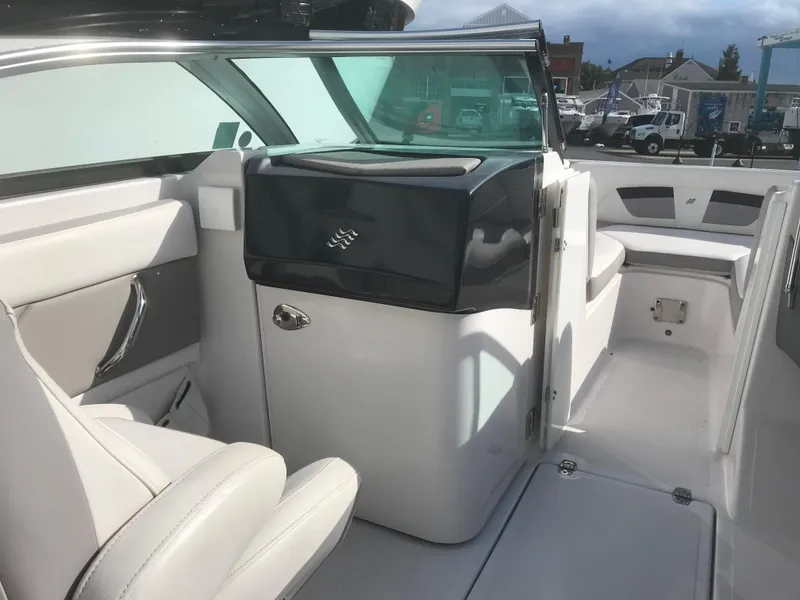 Slide: The Image of 2017 Four Winns HD220 OB boat interior with sleek seating and modern design. - 10