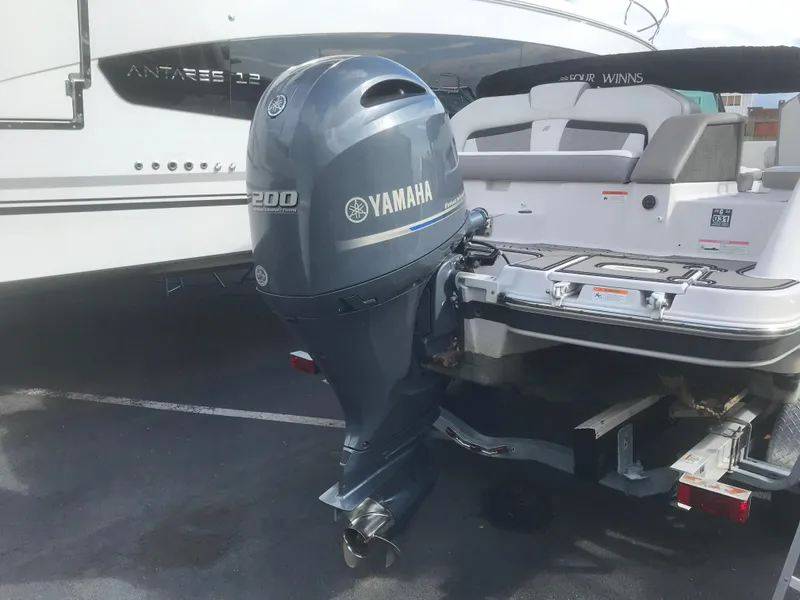 Slide: The Image of 2017 Four Winns HD220 OB boat with Yamaha 200 outboard motor. - 18