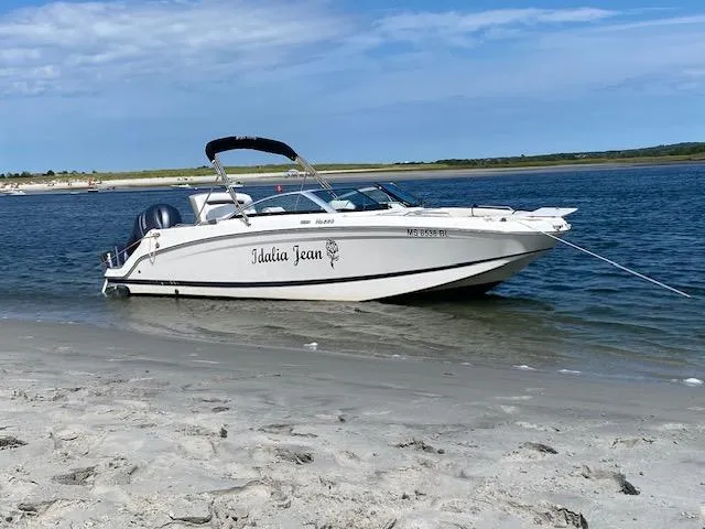 Slide: The Image of 2017 Four Winns HD220 OB boat anchored on sandy beach. - 7
