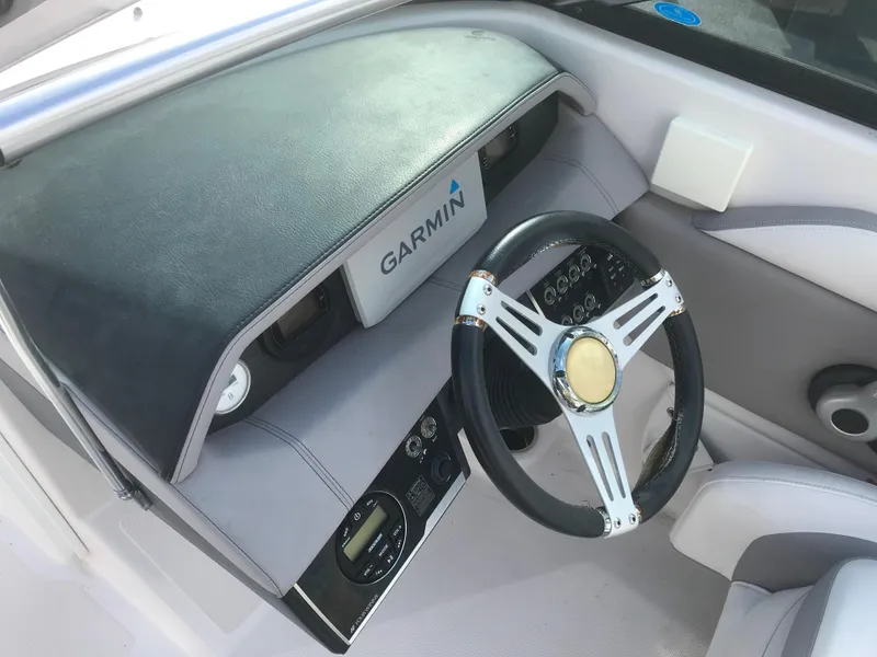 Slide: The Image of 2017 Four Winns HD220 OB boat dashboard with Garmin navigation system. - 9