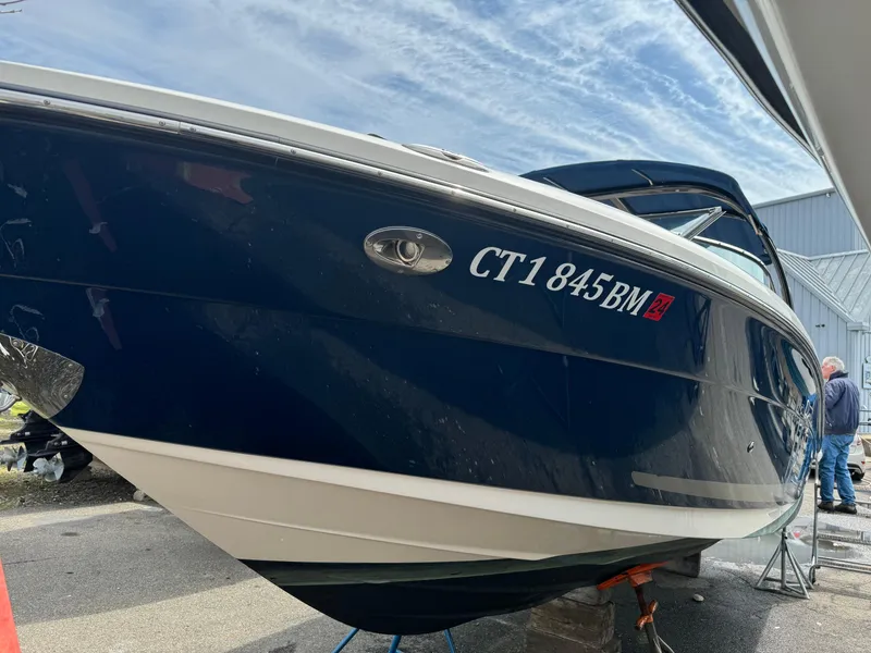 Slide: The Image of 2013 Sea Ray 270 SLX boat on trailer, blue hull, registration CT1845BM. - 1