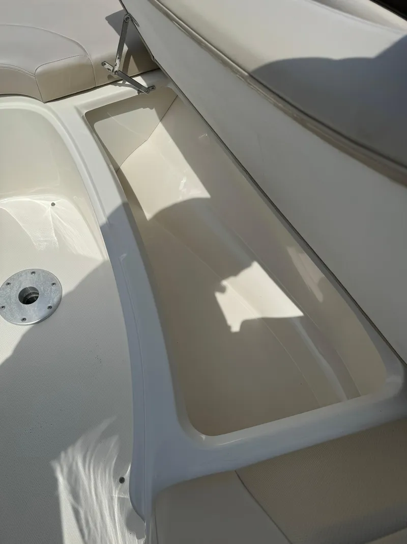 Slide: The Image of 2013 Sea Ray 270 SLX boat interior storage compartment. - 15