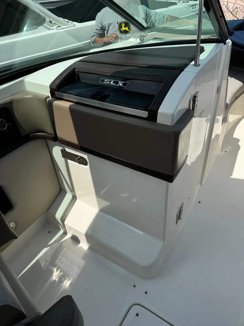 Slide: The Image of 2013 Sea Ray 270 SLX boat interior with sleek design and modern features. - 34