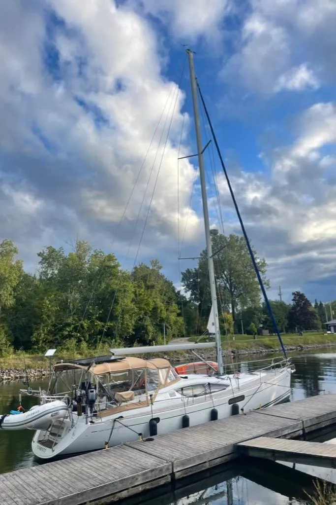 Slide: The Image of 2010 Jeanneau Sun Odyssey 50 DS sailboat docked under a partly cloudy sky. - 37