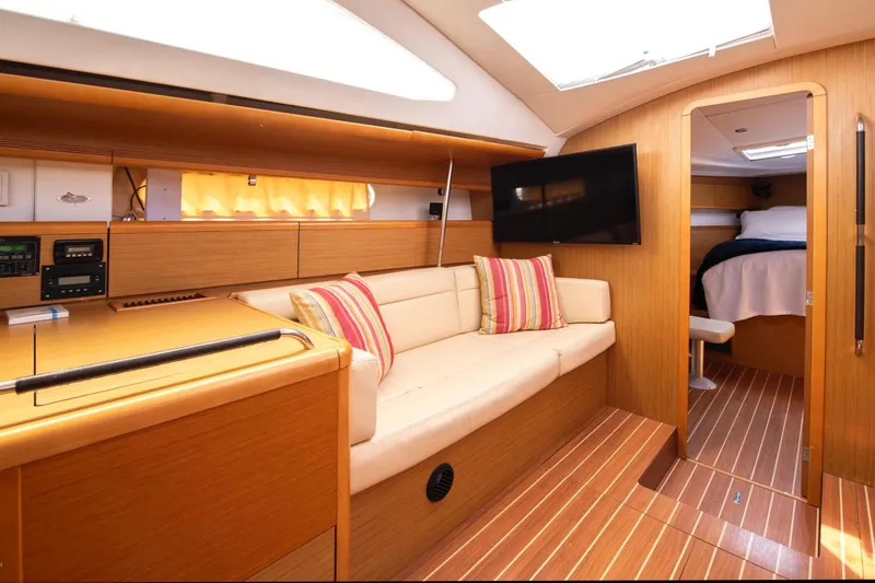 Slide: The Image of Interior of 2010 Jeanneau Sun Odyssey 50 DS yacht with cozy seating and modern amenities. - 48