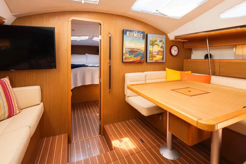 Slide: The Image of Interior of 2010 Jeanneau Sun Odyssey 50 DS yacht with cozy seating and decor. - 49