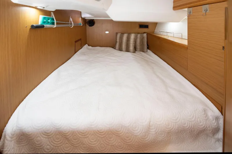 Slide: The Image of Cozy cabin interior of 2010 Jeanneau Sun Odyssey 50 DS with a comfortable bed. - 63