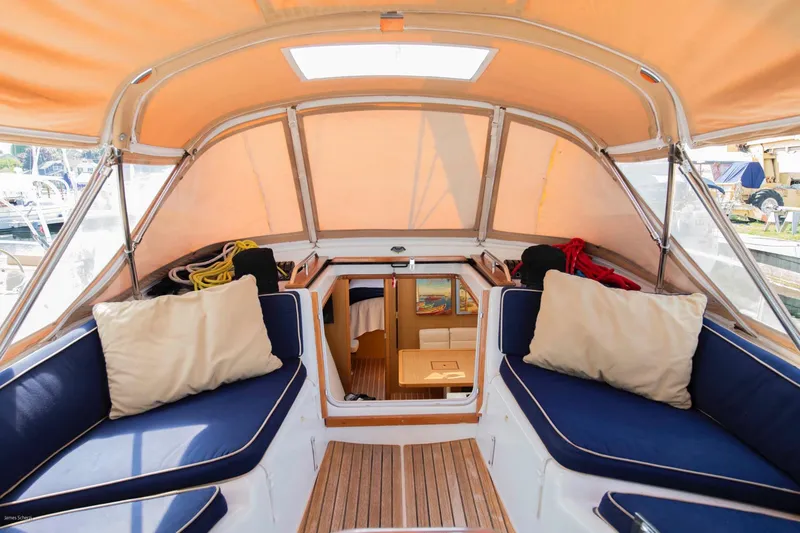 Slide: The Image of Interior view of 2010 Jeanneau Sun Odyssey 50 DS sailboat with blue seating and cushions. - 66