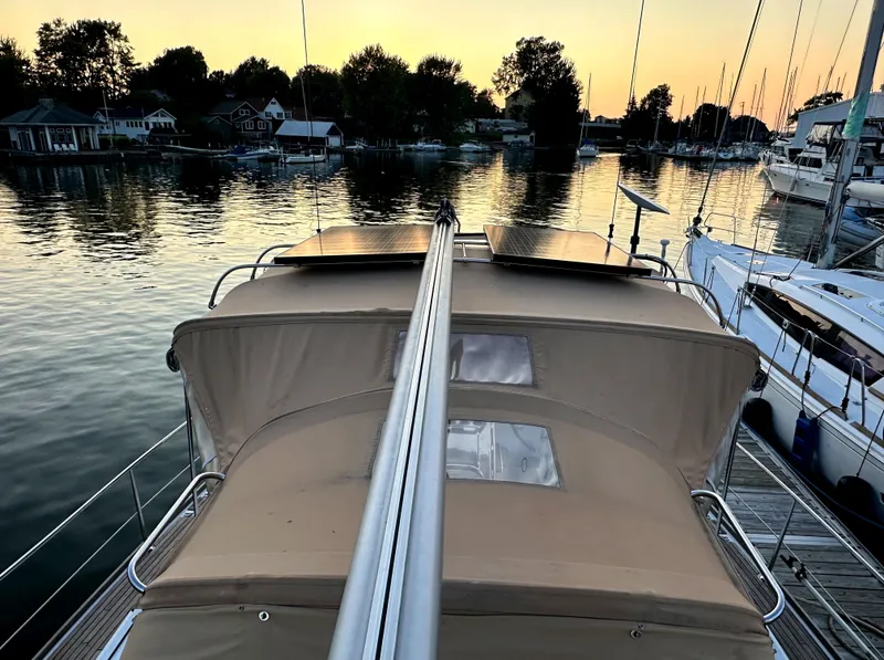 Slide: The Image of Jeanneau Sun Odyssey 50 DS sailboat docked at sunset, 2010 model. - 9