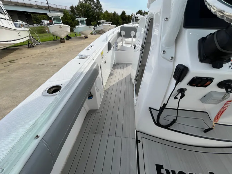 Slide: The Image of 2023 Everglades 253 Center Console boat interior with sleek design and modern features. - 21