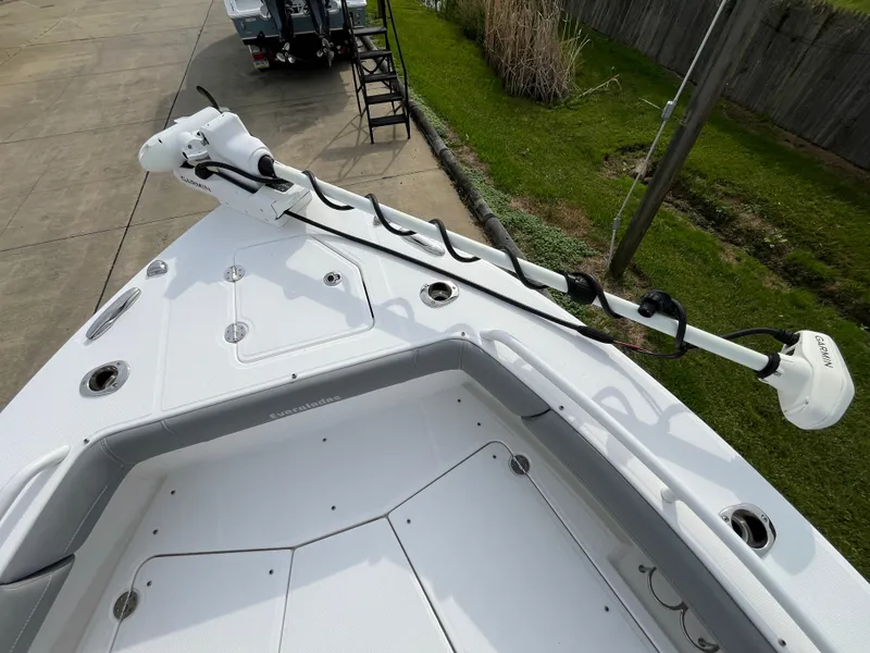Slide: The Image of 2023 Everglades 253 Center Console boat deck with trolling motor. - 28