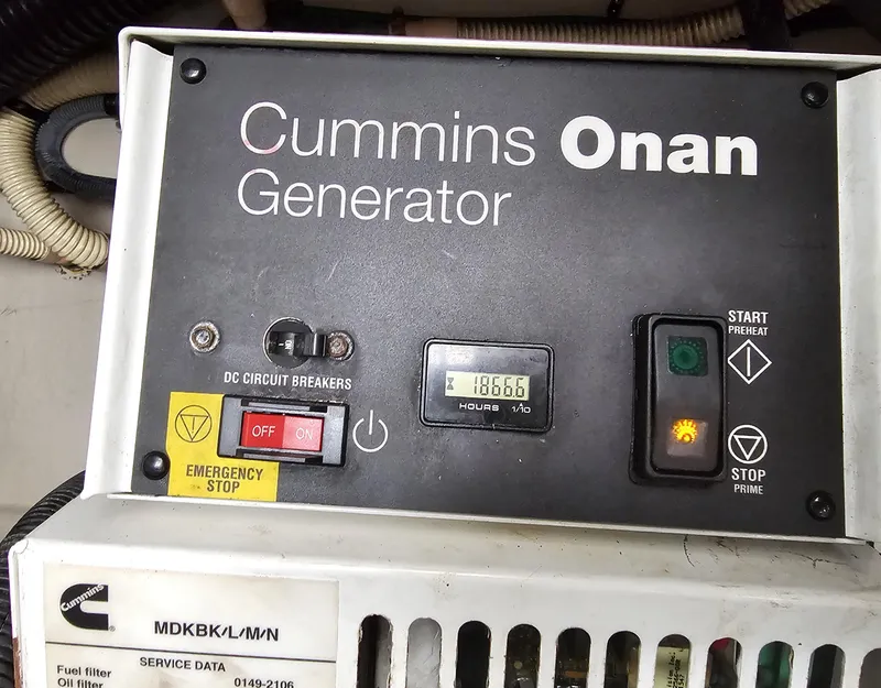 Slide: The Image of Cummins Onan generator control panel on 2012 Sea Ray SUNDANCE boat. - 24