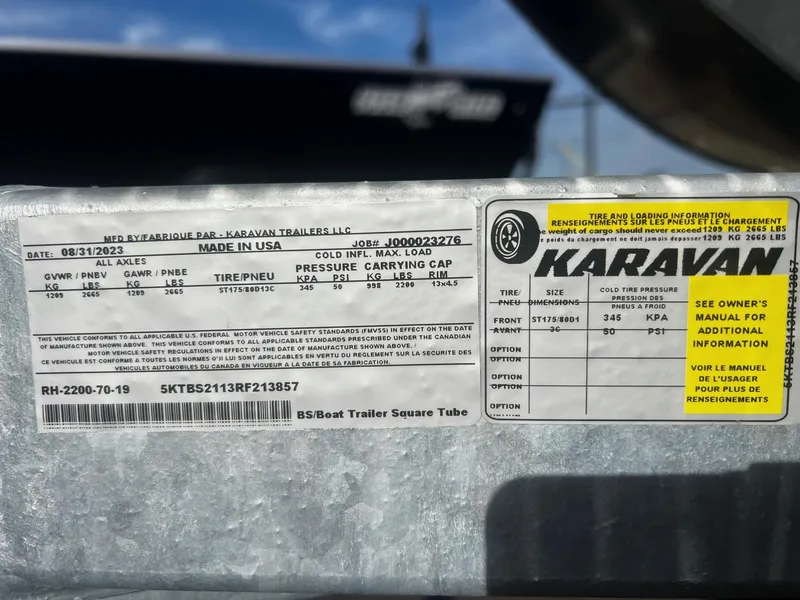 Slide: The Image of Label on Karavan trailer with specifications and safety information, 2025 Fish Rite Angler 18. - 16