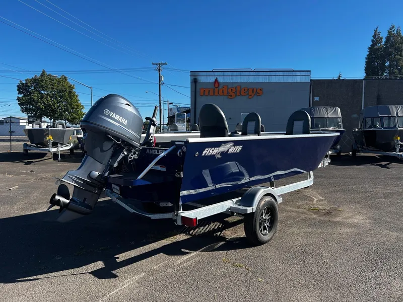 Slide: The Image of 2025 Fish Rite Angler 18 boat with Yamaha motor in parking lot. - 3