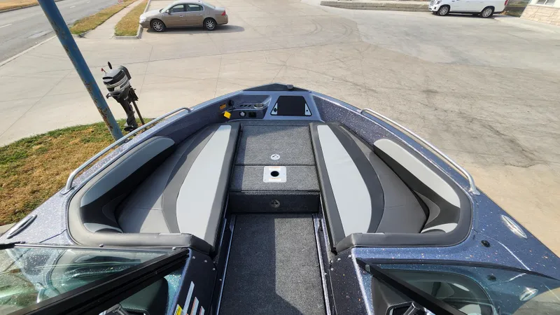 Slide: The Image of 2025 Lund 189 Tyee GL boat interior with seating and storage compartments. - 15