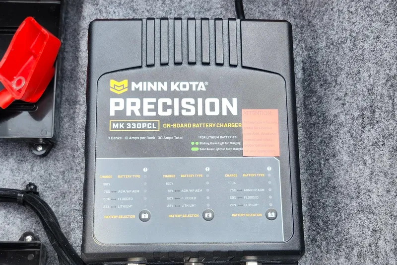 Slide: The Image of Minn Kota Precision MK 330PCL on-board battery charger in Lund 189 Tyee GL boat. - 26