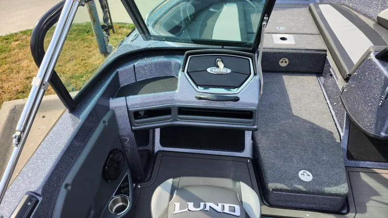 Slide: The Image of 2025 Lund 189 Tyee GL boat interior with seating and storage compartments. - 9
