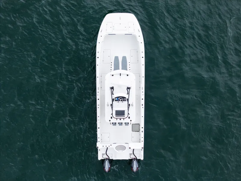 Slide: The Image of Aerial view of 2020 Invincible 35 Catamaran on open water. - 17