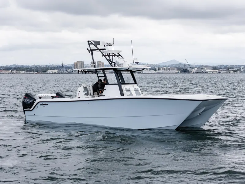 Slide: The Image of 2020 Invincible 35 Catamaran on open water, showcasing sleek design and powerful performance. - 4