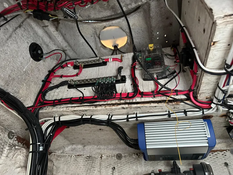 Slide: The Image of 1988 Wellcraft SCARAB SPORT wiring and electrical components in boat interior. - 27