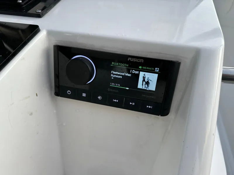 Slide: The Image of Fusion Bluetooth stereo on 1988 Wellcraft SCARAB SPORT boat console. - 32