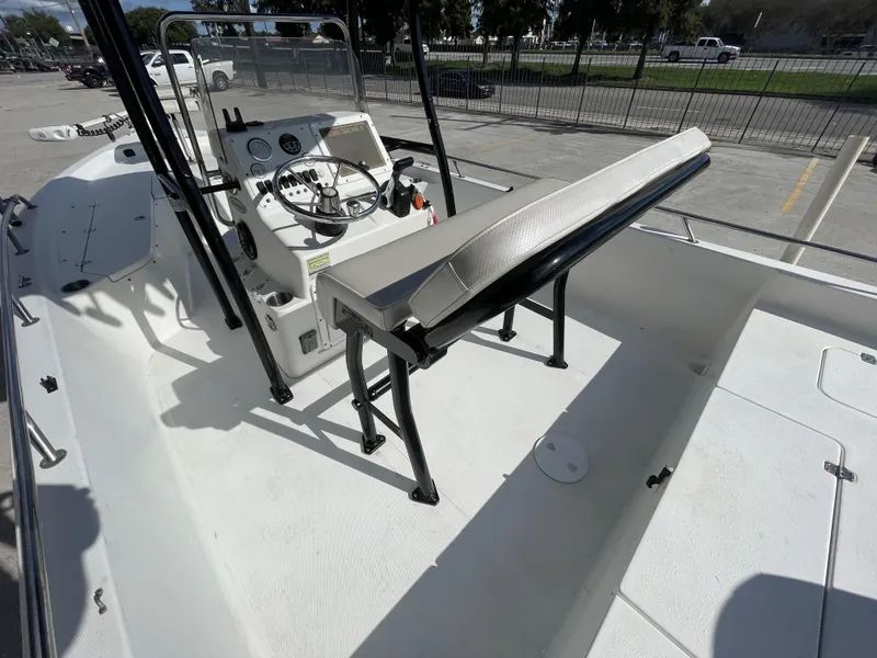 Slide: The Image of 2005 Sea Pro SV2100 boat interior with steering console and seating. - 17