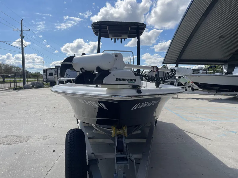 Slide: The Image of 2005 Sea Pro SV2100 boat on trailer under blue sky. - 8