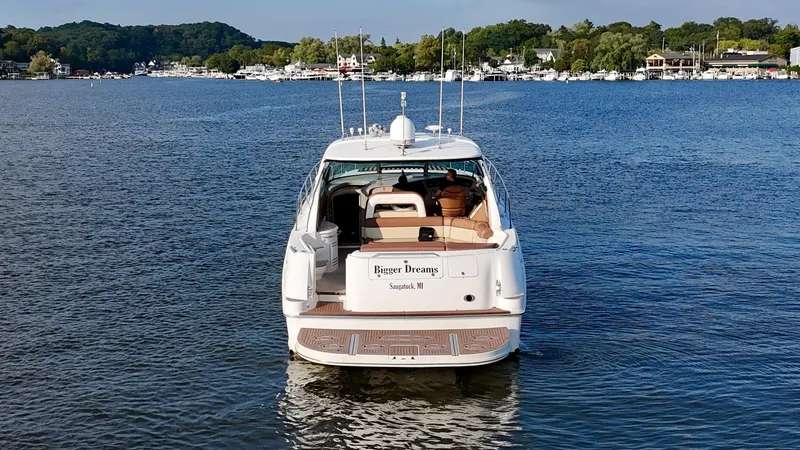 Slide: The Image of Sea Ray 510 Sundancer 2001 yacht on calm water, scenic background. - 15