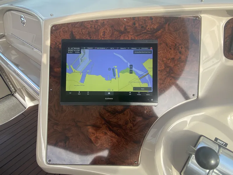 Slide: The Image of Garmin navigation display on 2001 Sea Ray 510 Sundancer yacht dashboard. - 33