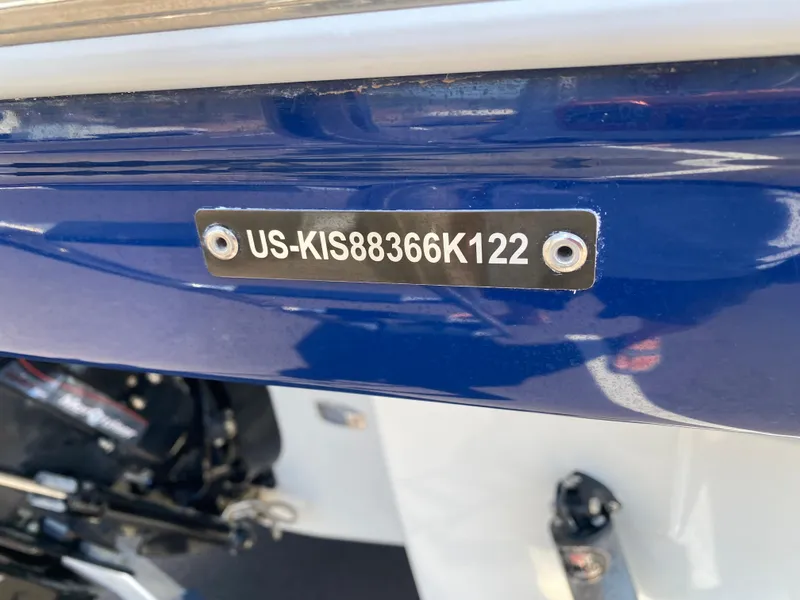 Slide: The Image of 2022 Crownline 264 CR boat with visible hull identification number. - 26