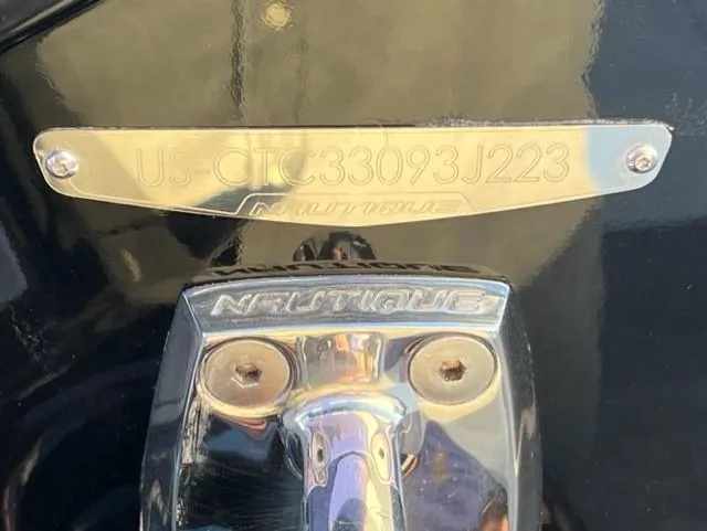 Slide: The Image of 2023 Nautique S23 boat identification plate with serial number. - 19