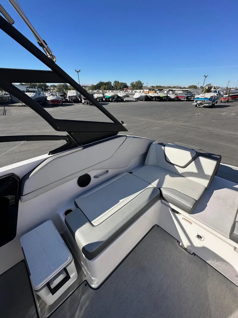 Slide: The Image of 2023 Yamaha AR250 jet boat interior with sleek seating and modern design. - 10