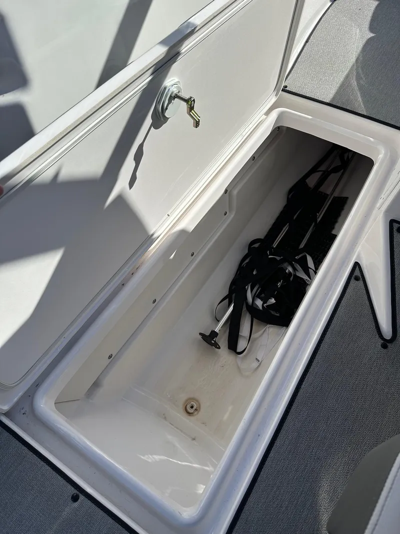 Slide: The Image of 2023 Yamaha AR250 storage compartment with equipment inside. - 20