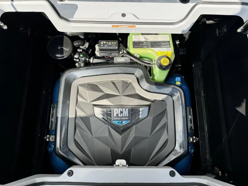 Slide: The Image of 2023 Nautique Super Air Nautique G23 engine compartment with PCM marine engine. - 10
