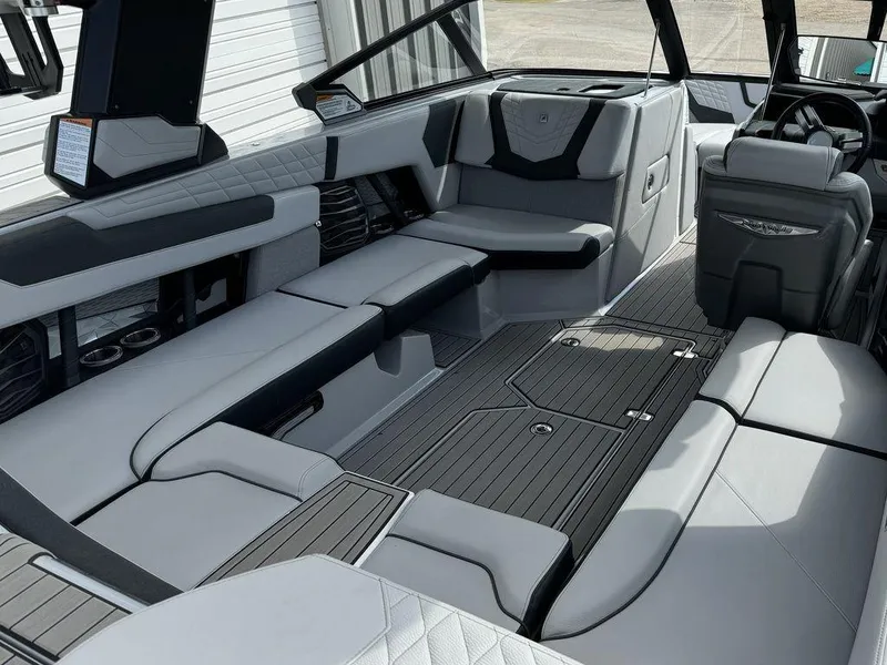 Slide: The Image of Luxurious interior of 2023 Nautique Super Air Nautique G23 boat with sleek seating and modern design. - 3