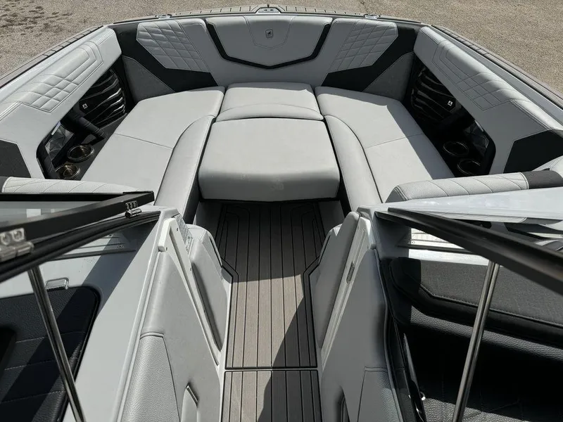 Slide: The Image of 2023 Nautique Super Air Nautique G23 boat interior with luxurious seating and modern design. - 5