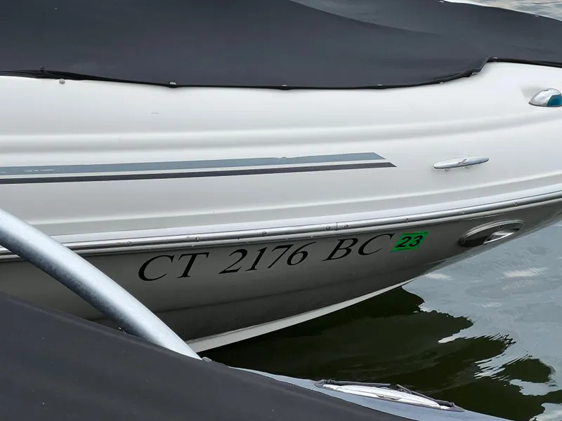 Slide: The Image of 2006 Sea Ray 200 Sundeck boat with registration CT 2176 BC on water. - 7