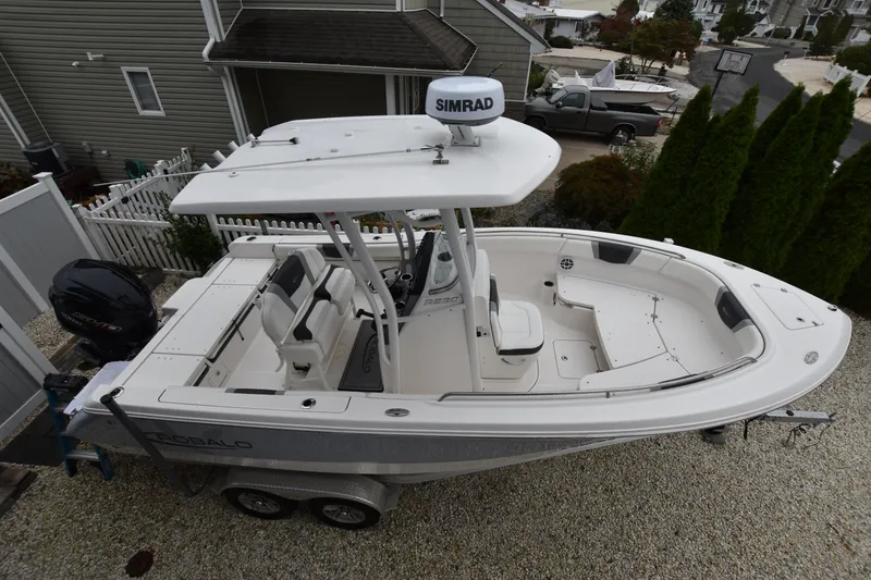 Slide: The Image of 2023 Robalo R230 Center Console boat on trailer, aerial view. - 12