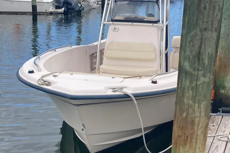 Slide: The Image of 2006 Grady-White 222 Fisherman boat docked in marina. - 3