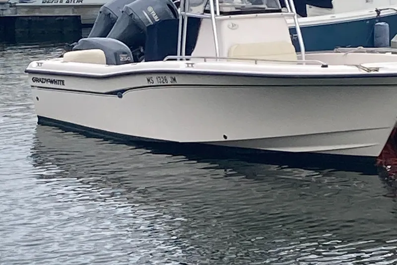 Slide: The Image of 2006 Grady-White 222 Fisherman boat docked with Yamaha engines. - 5