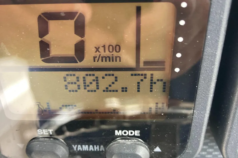 Slide: The Image of Yamaha engine display showing 802.7 hours on a 2006 Grady-White 222 Fisherman boat. - 9