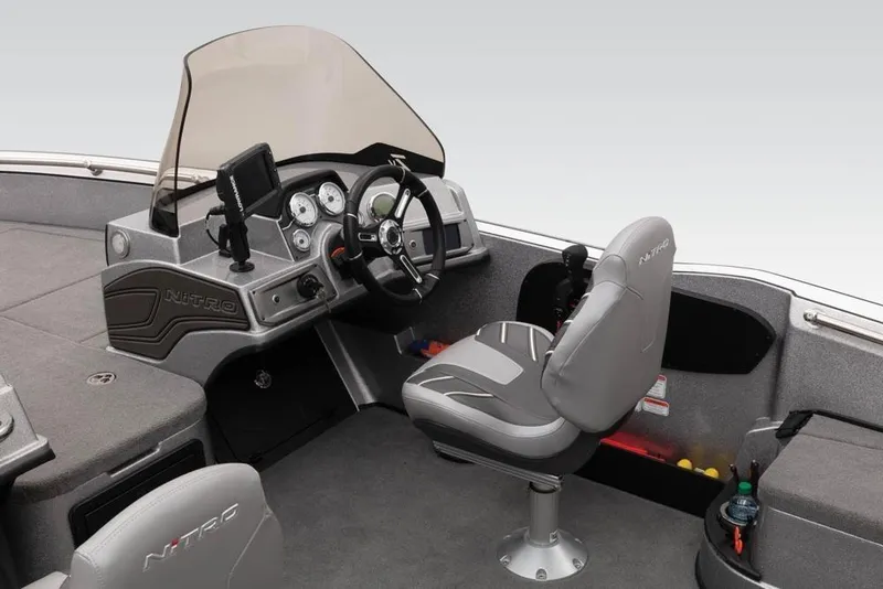 Slide: The Image of 2024 Nitro ZV20 boat interior with steering console and seating. - 11