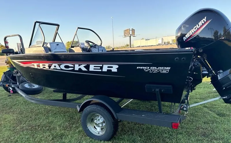 Slide: The Image of 2025 Tracker Pro Guide V-175 Combo boat on trailer, side view. - 2