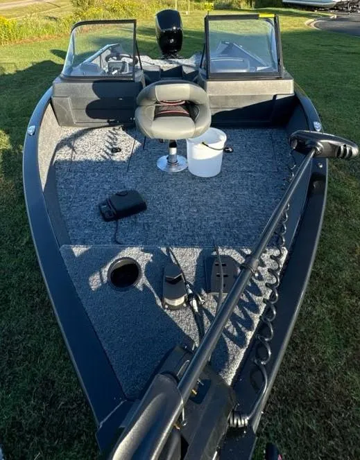 Slide: The Image of 2025 Tracker Pro Guide V-175 Combo boat with fishing gear on deck. - 7